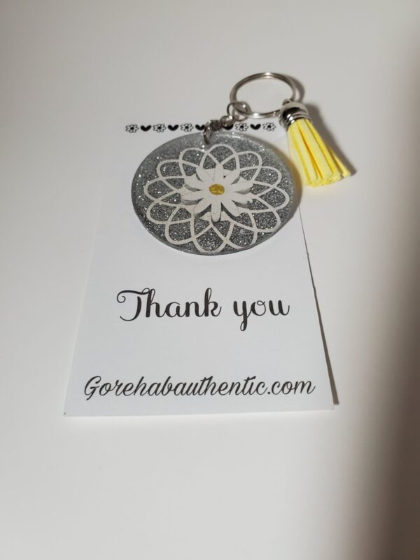 Silver Flower Acrylic Keychain with Yellow Tassel